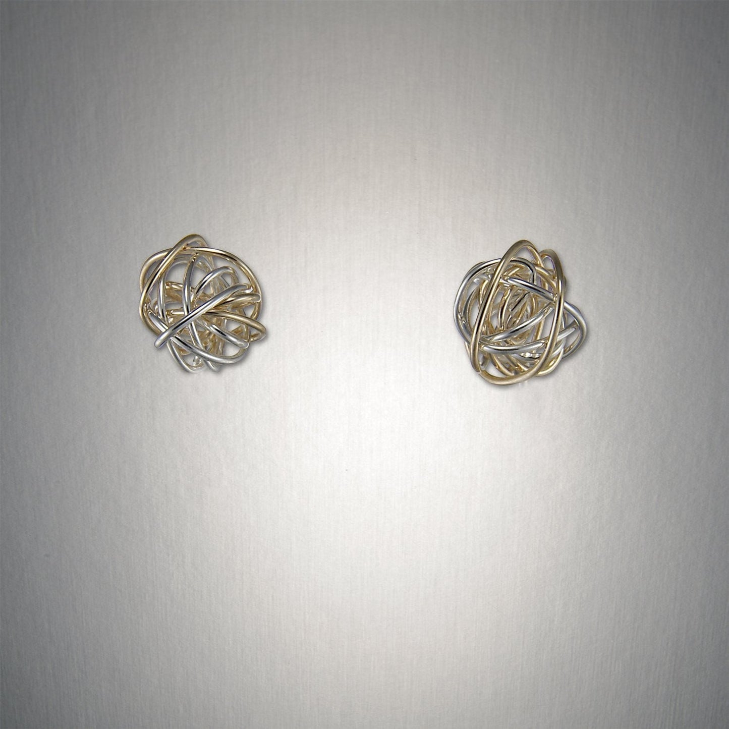 Mixed Metal Knot Small Post Earring🎨 Jewelry🎨 Buy Art at Carolina Creations Gallery in Downtown New Bern🎨